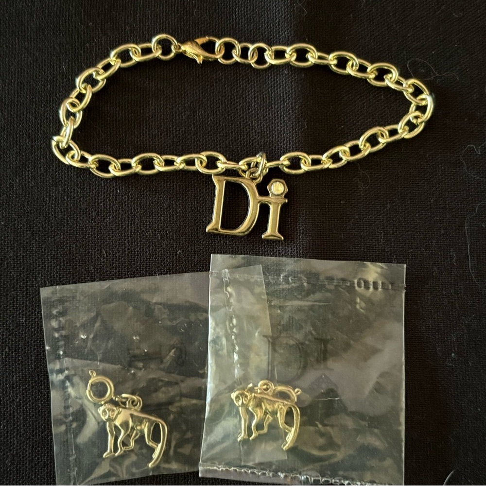 Diamond International Gold Charm Bracelet Set. 8 bracelets multiple charms. - Picture 8 of 15